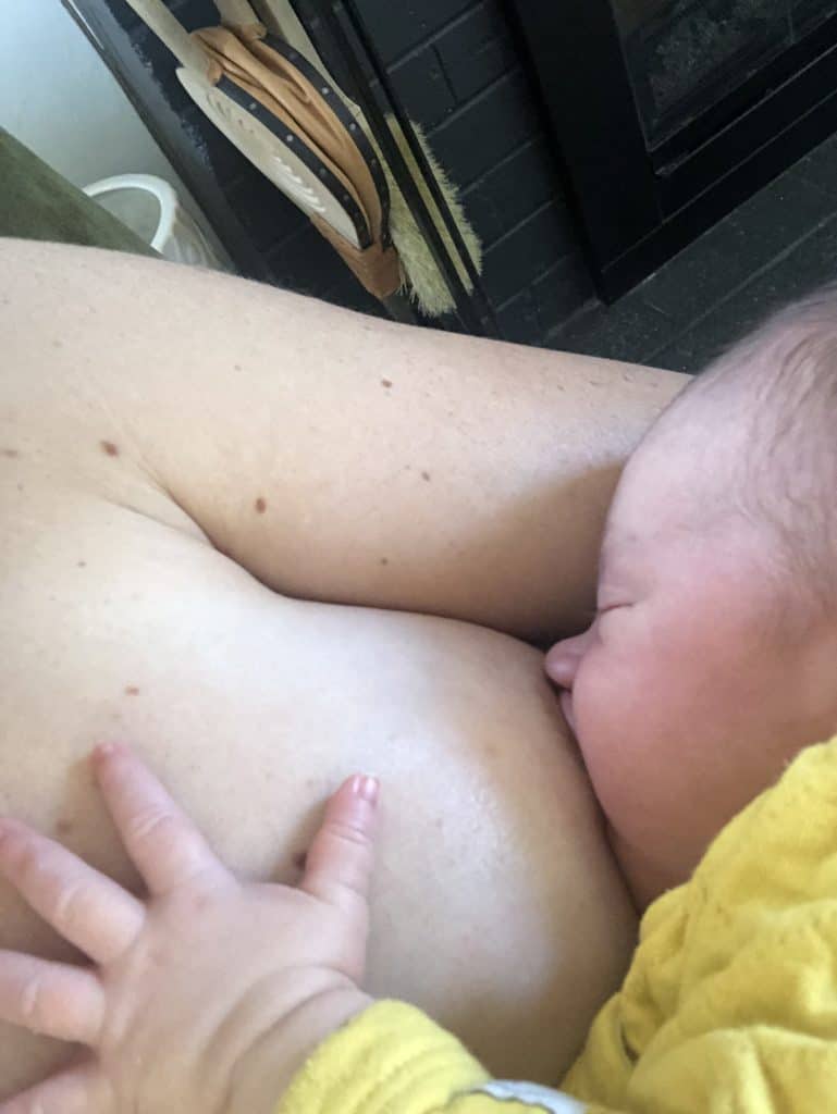 Young baby breastfeeding