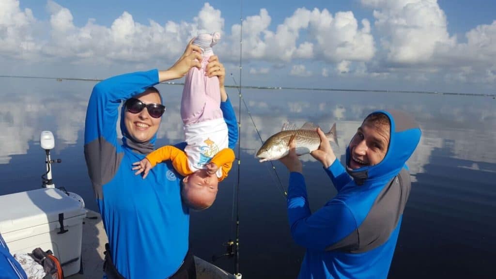 Family with toddler and fish