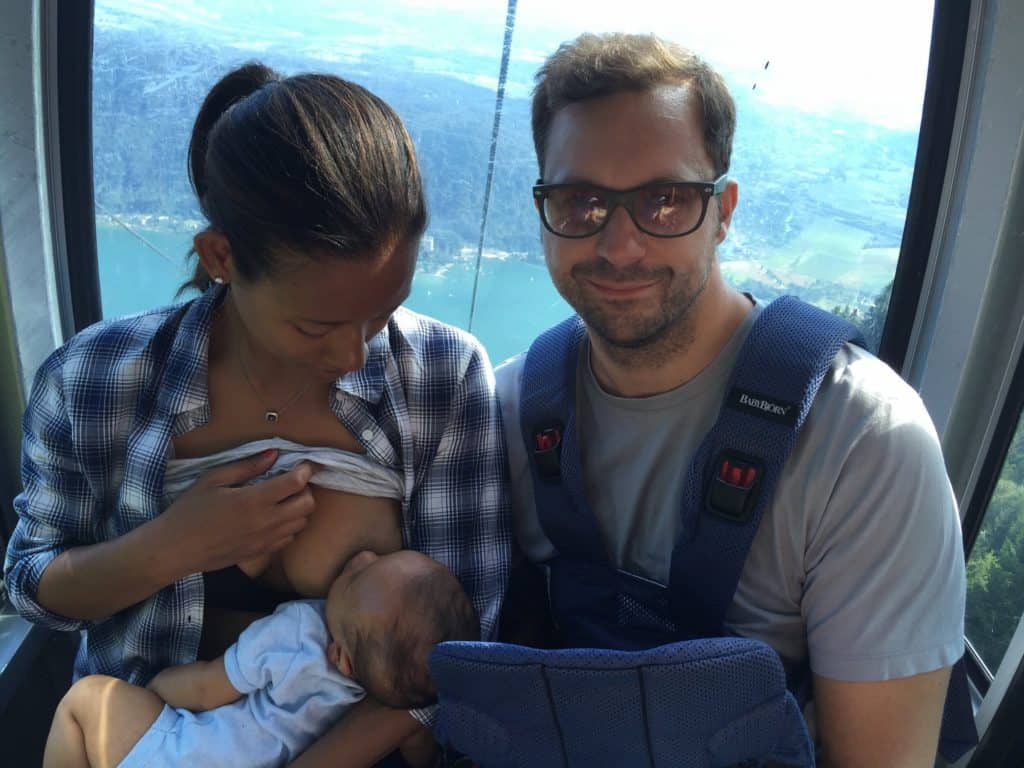 Family at high altitude where mom is breastfeeding child