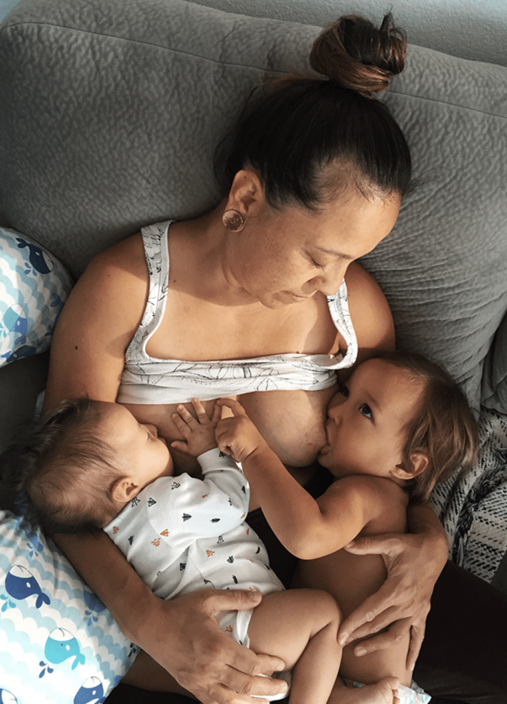 Mom tandem breastfeeding