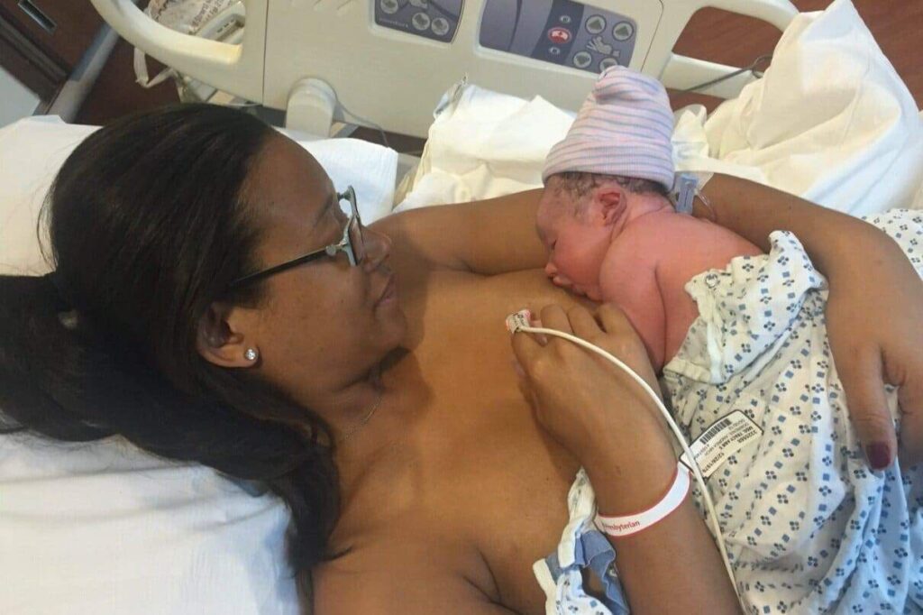 Mom breastfeeding right after birth